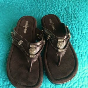 Womenswear size 7 brown Minnetonka sandals new in box